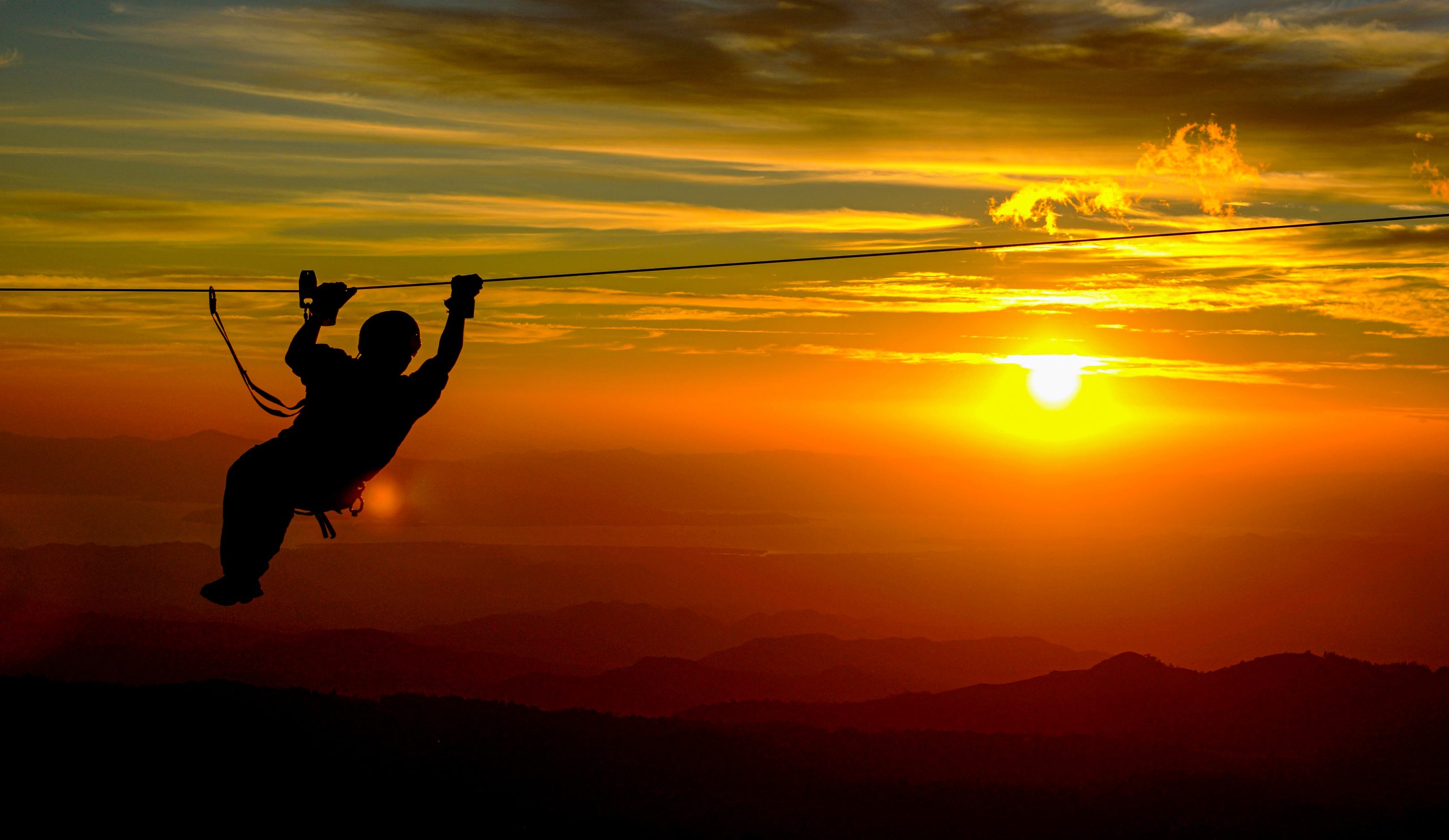 Costa Rica zip line at sunset